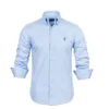 2024 NUEVA Moda de manga larga Fit Slim Color sólido Camiseta informal Diseñador Camisa de negocios de ropa de algodón de algodón puro de alta calidad