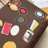 VOYAGE TOTE TAZE WEEKENDE Designer Tassen Handtas Grote capaciteit Winkelen Schoudertas Vintage Hotel Label Stickers Cowhide Lederen Trim canvas Reistassen