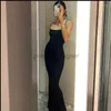 Basic Casual Dresses Designer 2024 Zomer spaghetti -band Black Long Jurk Dames Mouwloze solide magere bodycon trompet Maxi Sexy Vestidos W625RH