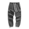 Jeans masculinos 2024 Novos calças de harém Casual Student Pockets Color Solid Hip-Hop Jogger masculino Roupas de rua de rua Jeansl2404
