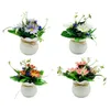 Flores decorativas de planta realista em vasos de plantas elegantes