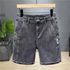 Jeans masculinos Verão fino masculino shorts jeans de jeans da moda e casual elástico