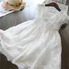 Robes de fille robes de dentelle blanche pour filles 2024 Nouvelle robe de plage d'été Broidery Clothers Enfants Enfants de mariage fête des vacances pour enfants 2404