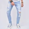 Mäns jeans vår och höstmän öppna främre jeans extremt tunna mensbyxor fashionabla elastiska hål blyerts casual jeansl2404