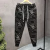 2024 Herrkläder Nya Pi Shuai Tryckt trendiga jogvarumärken Spring/Summer Tie Feet For Youth Autumn Mens Joggers Pants