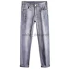 Jeans de créateurs pour hommes jeans européens jeans élastique élastique slim slim small pieds droits mode pantalon gris pour hommes lavés à la mode