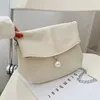 Bolsas de ombro uosc moda fêmea pérola bolsa 2024 mola saco de bolsa diagonal de cor sólida casual pacote quadrado pequeno