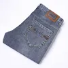 Jeans 2024 för Mens Light Luxury Tryckt high end europeiska modemärke Slim Fit Small Right Ben Elastic mångsidiga byxor