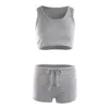 QR00女性のトラックスーツ2020 HOT SUMMER WOMENS YOGA SET 2PCS WOMENS BELT SET BRA SOREVELESS VESTベスト半袖フィットネスランニングヨガジムスポーツウェア240424