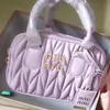 Bowling Handbag Lady Designer Sac mode crossbody luxurys même pochette sac pour femmes sac à main pour hommes