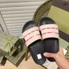glissades de haute qualité femmes pantoufles pantoufles de luxe sandales de marque sandales de fleurs réelles tôles en cuir appartements glissent les chaussures décontractées bottes bottes par newshoes plates