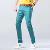 Jeans masculinos 2023 Autumn Novo masculino Jeans elástica de fitness de jeans de jeans retos de pernas retas de pernas vermelhas lago azul amarelo mensl2404