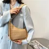 Sacs à bandoulières Grille Design Fashion Simple Femme Small 2024 Spring Trend Trend Quality Sacs Femme Luxury Pu Leather Crossbody Sac