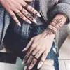 JK15 Tattoo Transfer 1 paire Nouveau Mehndi Indian Style Beauty Tattoo Pochies Temporary Hand Decal Diy Body Art Henna Template Henna Sticker 240426