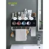 Zahnbürstenhalter Ecoco Zahnbürstenhalter Zahnbürsten Tasse Wand montiertes Badezimmer perforiert nicht wandmontierte Lagerregal Zahnbürstenbecher Set 240426