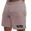 Shorts masculins pour hommes et femmes shorts en tissu nylon à cinq points densière de sport lâche séchage rapide en dentelle solide même style d240426