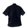 Kvinnors t-shirtdesigner 24 vår/sommar ny mångsidig casual modebrev broderad veckad knapp stickad skjorta korta ärmar dpti