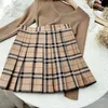 Spódnice Plaid Stripes Spódnica Koreańska wysoka talia Khaki All-Match Mini spódnica SWT Girl Dent Style JK mundury plisowane spódnica nowa Y240420