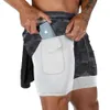 Shorts masculins pour hommes shorts de train de fitness été noirs décontractés 2-en-1 Séchage rapide de gym de course short extérieur ultra-mince pantalon J240426