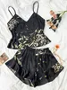 Kobietowa odzież sutowa wiosna letnia imitacja jedwabna piżama dwuczęściowy ślady mody drukowane szorty domowe kombinezon seksowne kantar Y240426