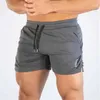 Mäns shorts 2019 Ny fitness sport shorts sommar gym träning män andas mesh shorts snabb torkning strand shorts mens sport slitage j240426