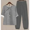 Kvinnors tvåbitar byxor Fashion Women Casual Loose Pants Set Spring Summer Stripe Print Loose Outfits Overized O Neck Top Suit Pullover Lady Tracksuit Y240426