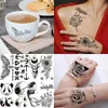 Tattoo Transfer 66 Blätter kleiner schwarzer temporärer Tattoos für Frauen Männer Gesicht Hals gefälschter Tattoo Aufkleber Realistischer Schädel Blumenstar Tatoos Kits Spaß 240426