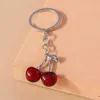 Llaves de llaves llaves de cerezo de cerezo de fruta de cordones para el automóvil regalos de recuerdo para mujeres colgantes de bolsos de hombres accesorios de joyería de bricolaje de bricolaje