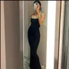 Robes décontractées Designer 2023 Spaghetti Spaghetti Black Robe longue Femme sans manches Solide Skinny Bodycon Conette Maxi Robes sexy
