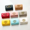 luxurys flap quilted coin pouch pourseレザーデザイナーキャビアキーチェーン7aレッドウォレットキーポーチレディースコイン財布財布