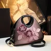 Flower Personalized Dumpling Bag Nisza torebka 2024 Temperament w średnim wieku mama wszechstronna patentowa skórzana crossbody