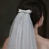 Wedding Hair Jewelry V839 Nowy przylot ślub ślubny krótki biały welon tiul dwupowłoniowy satynowy łuk narzeczak na ramię w zasilanie akcesoria małżeńskie