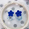 Stud -oorbellen Europese en Amerikaanse ornamenten Bloemspray Verf Geometrische ronde Haze Blue Metallic Wind Acryl