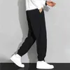 Pantalon masculin sport porte des pantalons de glace de gym pantalones couleurs massives pantalon harem à la mode semelle décontractée jogger pour hommes élastiques