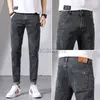 Jeans masculin printemps jeans masculins pour les pieds élastiques pantalon pantalon en denim masculin et pantalon de taille plus