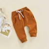 Byxor byxor för småbarn Baby Boys and Girls Newborn Elastic Midje Justerbar borstad fast färg Casual Loose Fit Lämplig för 0-3 år lång pantsl2404