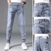 Mäns jeans Vår/sommar Nya herrar Jeans Youth Slim Fit Small Feet Pants Men's Trendy Casual Elastic Large Size Denim Plus Size Pants