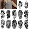 Tatuagem Transferência de 12pcs/Defina o adesivo de tatuagem da floresta negra para homens mulheres tigre lobo crânio temporário falsa henna esqueleto rei animal tatoo 240426