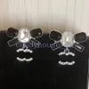 Kryształowe kolczyki projektant biżuterii kolczyki Pearl Studs 925 Srebrna moda Vogu