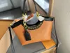 Retro Kabartmalı Karnavatalı Sepet Çanta Kadın Tasarımcısı Omuz Çantası Çanta Yüksek Yüksek Kaliteli Alışveriş Çantası Altın Zincir Moda Büyük Kapasite Momi Bag