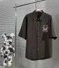 Skjortor Luxury Designer Men's T Shirts Mens Spring Autumn Denim Shirt T-Shirts Långärmad knapp-ner upp toppar Casual Chemise Luxe Masque Coconut Casablanca Turn #05