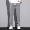 Herrenhosen Neue Frühlings-/Sommer -Baumwoll -Herren Casual Hosen Klassiker gebürstete elastische Taille Dünne elastische blaue Jogging Arbeit Frachtherren2404