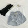 Kvinnors shorts snör upp casual sommar shorts kvinnor elastiska smala raka shorts damer mode strand hög midja svart vit shorts kvinnlig d240426