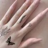 Transfert de tatouage Autocollants de tatouage à fleurs noires pour le bras à main Tatouages temporaires imperméables pour femmes papillon faux manche de tatouage Tatoos Girls 240427