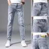 Mäns jeans Vår/sommar Nya herrar Jeans Youth Slim Fit Small Feet Pants Men's Trendy Casual Elastic Large Size Denim Plus Size Pants