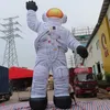 Buitenactiviteiten 8mh 26ft High Orange opblaasbaar astronaut Model opblaasbare Spaceman Cartoon Air Ballon met ventilator te koop