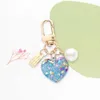 Nyckelringar lanyards utsökta harts kärlek hjärtan nyckelring söt pärla hänge nyckelring för kvinnor väska ornament bil nyckelhållare smycken tillbehör gåva