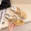 Slippare gummi 2024 Rhinestone dusch sommarhusklipp tår silver kvinna guld sandaler flip flops strand eleganta bilder