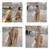 Designer di trench da donna Designer 2022 Coat in stile plaid europeo e americano Luxio Punti finti Due gocce di mezza lunghezza sciolte Deliv otnoq