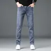 Jeans masculin printemps / été nouveau jean masculin jeune pantalon élastique pantalon gris bleu grand jean masculin plus pantalon taille